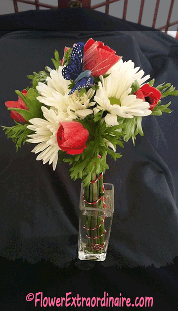 red tulips white daisies blue butterfly flowers in vase