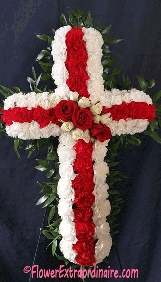 red and white cross made from flowers